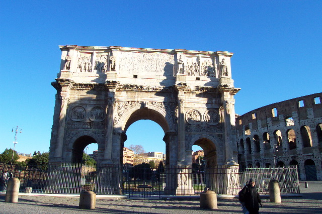 In front of the Constantine arch and Colosseum, Rome